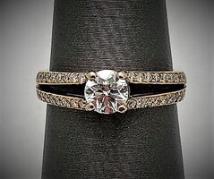Size 4 18k Ring with .50ct Center Diamonds surrounded by 2 rows of diamonds