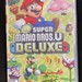 Super Mario Brothers U Deluxe with Case Nintendo Switch 