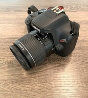 Canon EOS Rebel T100 DSLR Camera with EF-S 18-55mm Lens and Charger 